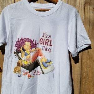 "It's a girl thing" on front of white Tshirt, med.